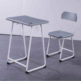 中国 基本的な学生の机および椅子は調節可能な高さ/本のホックによって置きました サプライヤー