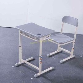 中国 アルミニウム フレームの調節可能な標準的な中学校学生の机および椅子の高さ サプライヤー